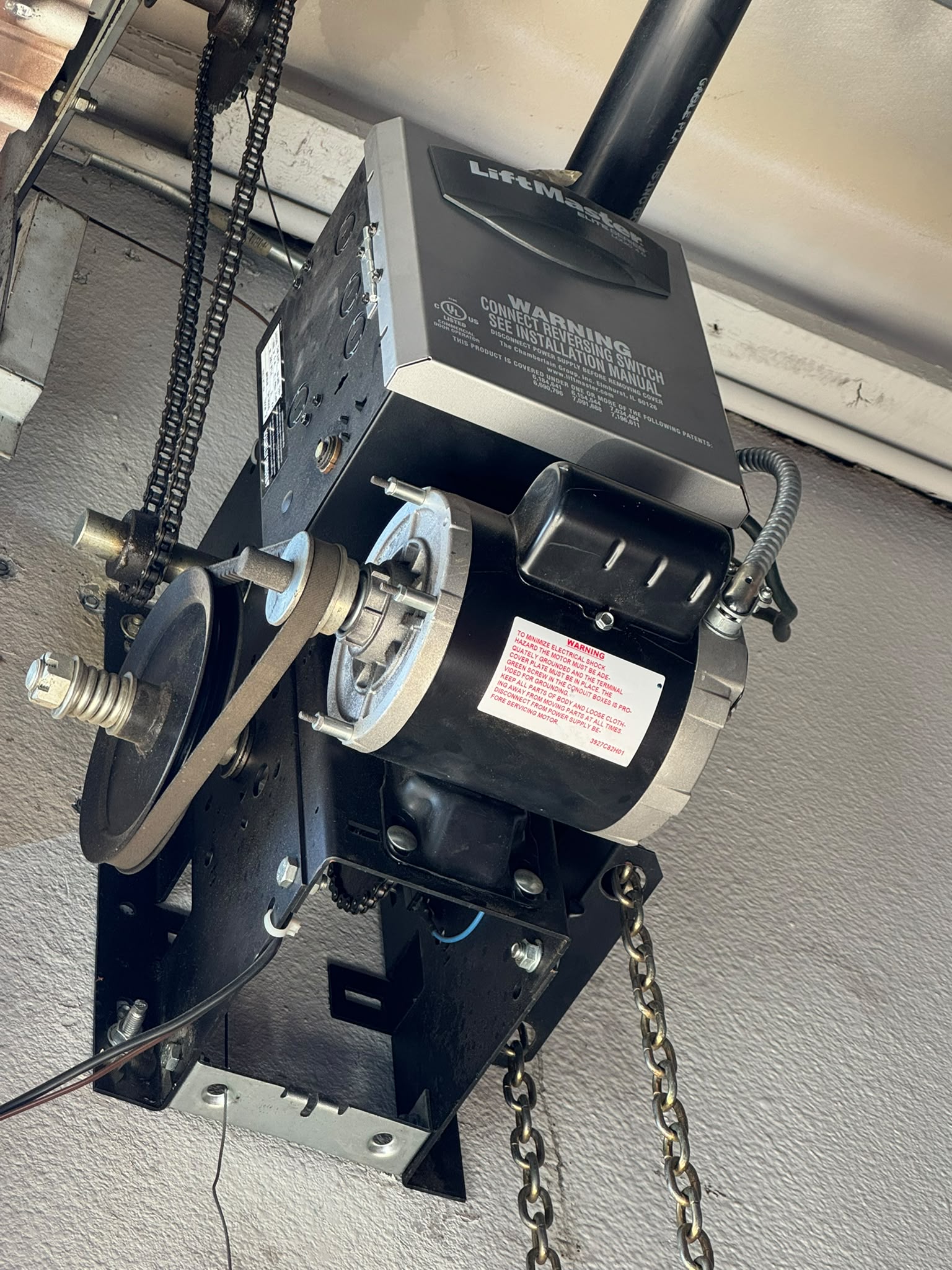 LiftMaster commercial jackshaft gate and door operator mounted beside a commercial door